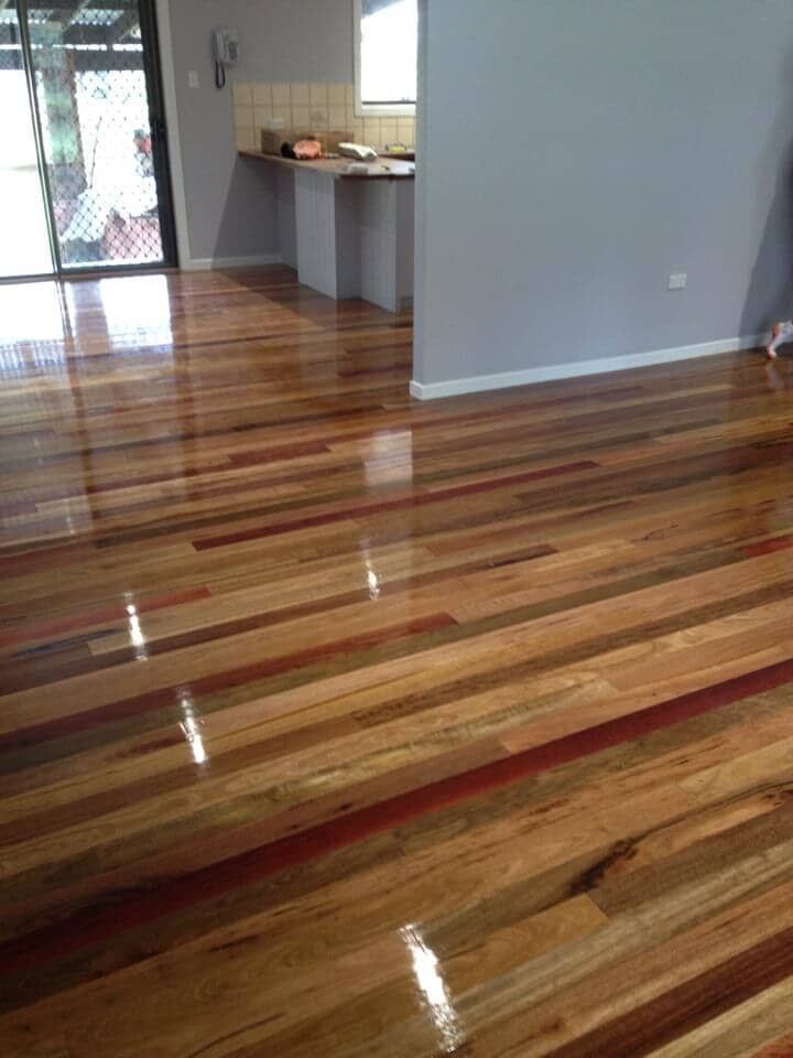 Polished hardwood flooring supplied by Budget Timbers
