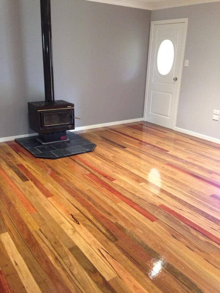 Polished native hardwood floor supplied by Budget Timbers